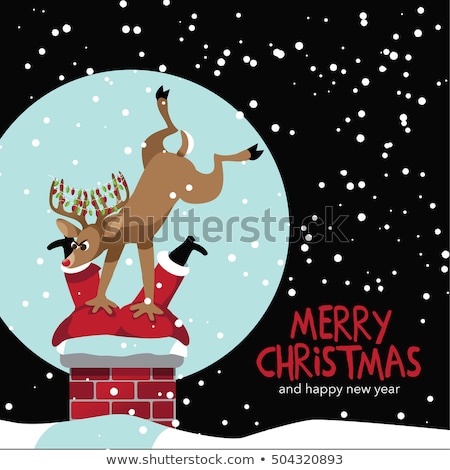 Stock photo: Reindeer Pushes Stuck Santa In The Chimney