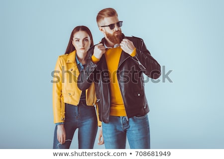 Stok fotoğraf: Young Couple Posing In Leather Clothes