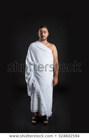 Сток-фото: Young Man Muslim Pilgrim In White Traditional Clothes