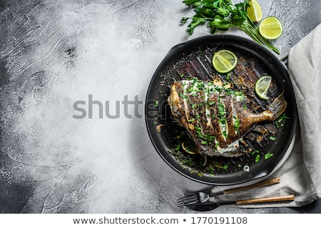 [[stock_photo]]: Roasted Fish With Sauces Fresh Herbs And Lime