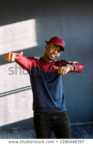 Stockfoto: Joyful African Old Man In A Baseball Cap