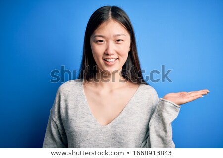 Foto stock: Close Up Of A Beautiful Asian Woman With Long Hair