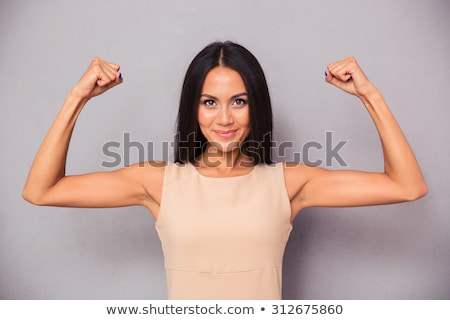 Stock fotó: Woman Showing Her Biceps