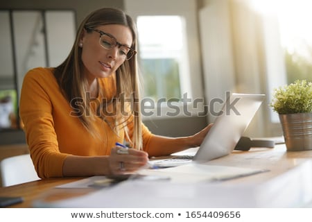 Foto d'archivio: Happy Woman With Eyeglasses