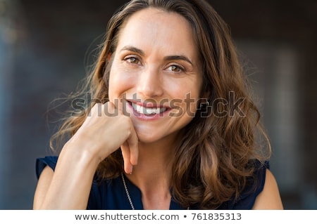Foto stock: Portrait Of A Smiling Mature Woman