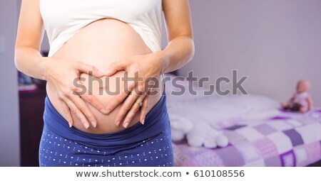 Сток-фото: Fuzzy Image Of Pregnancy Bedroom