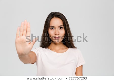 ストックフォト: Serious Young Lady Showing Stop Gesture