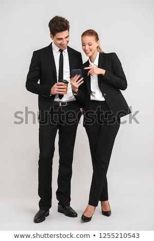 Foto d'archivio: Two Smiling Business Partners Isolated On White