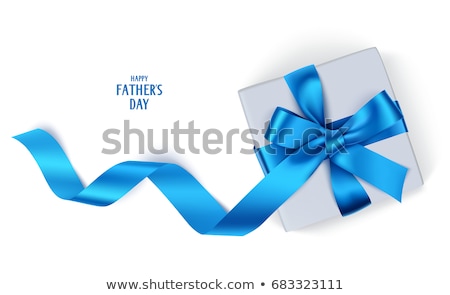 Foto stock: White Gift Box With Blue Bow And Ribbon Top View Element For Decoration Gifts Greetings Holidays