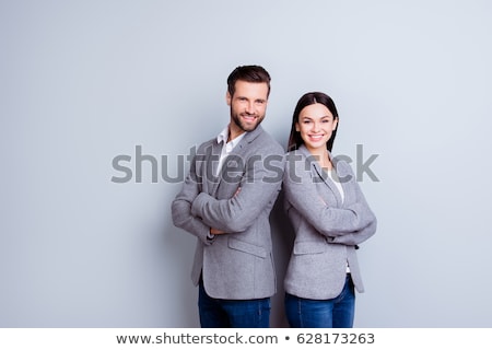 Stock photo: Couple In Business Suits Standing Back To Back