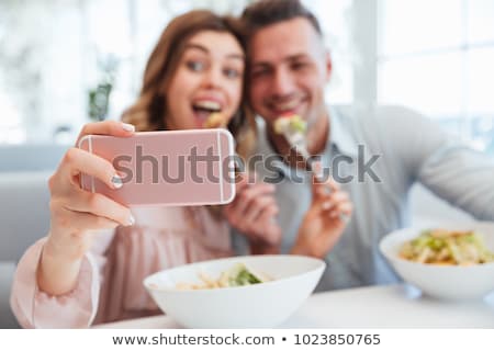 Stockfoto: Couple Taking Selfie By Smartphone At Restaurant