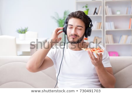 Zdjęcia stock: Man Eating Pizza Having A Takeaway At Home Relaxing Resting