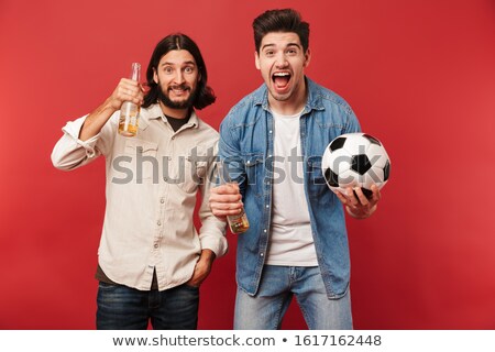 [[stock_photo]]: Photo Of Excited Guys Fans Holding Beers And Soccer Ball