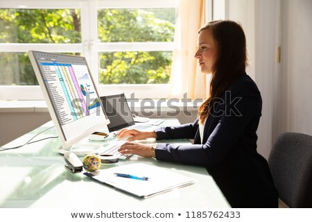 Foto stock: Analyst Woman Working With Spreadsheet Report Software