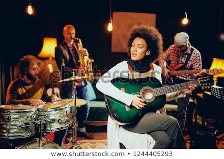 Foto stock: Female Guitar Player