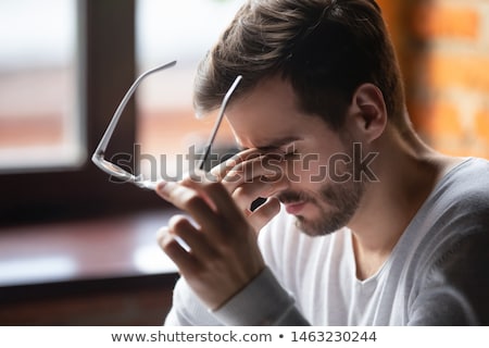 Foto stock: Overwhelmed Worker