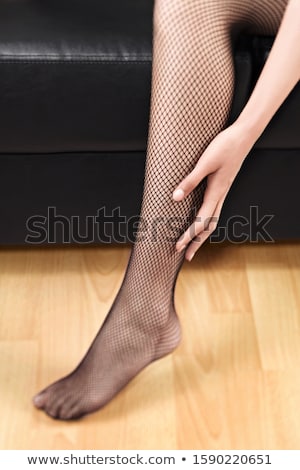 Stok fotoğraf: Close Up Of Caucasian Woman In Pattern Stockings