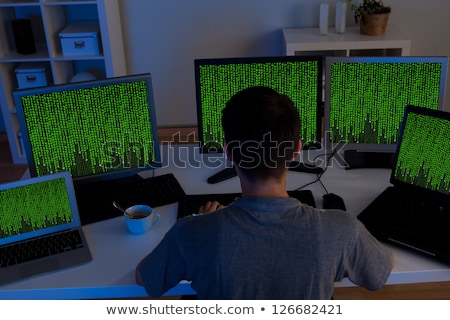 Stock photo: Hacker Sitting Streaming Data