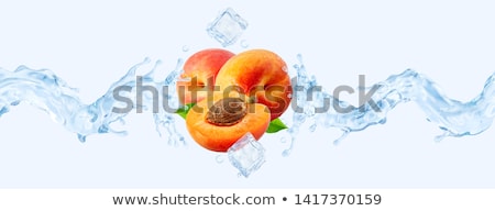 Stock foto: Juicy Peach In Ice Cube