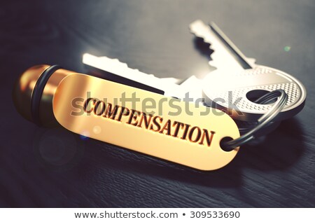 Stock fotó: Keys With Word Compensation On Golden Label