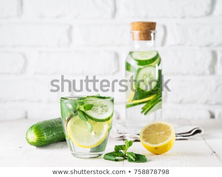 Stockfoto: Infused Water With Citrus And Mint In Glass Bottles