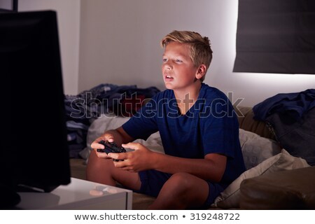 Stockfoto: A Teen With Video Game Addiction Problem
