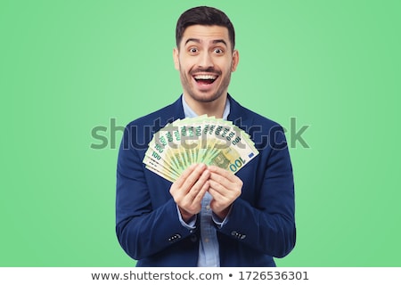 [[stock_photo]]: Businessman Holding Euros