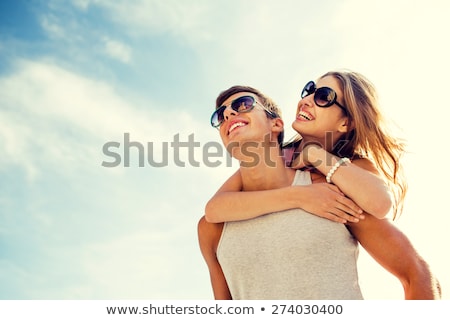 Foto stock: Young Couple In Love Having Fun In Summer Outdoor