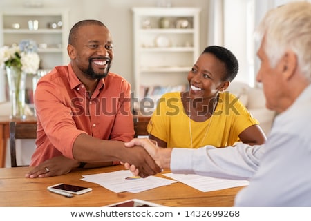 Foto d'archivio: Couple With Financial Advisor