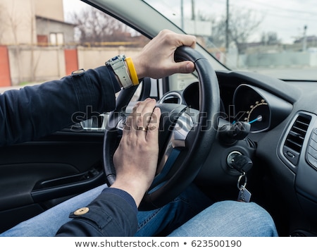 Foto d'archivio: Nervous Male Driver Pushing Car Horn In Traffic Rush Hour