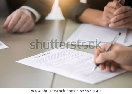 Сток-фото: Female Executive Approves Business Plan And Signing Document