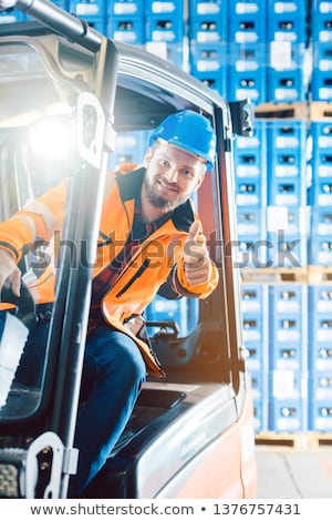 Сток-фото: Workers In Logistics Distribution Center Showing Thumbs Up