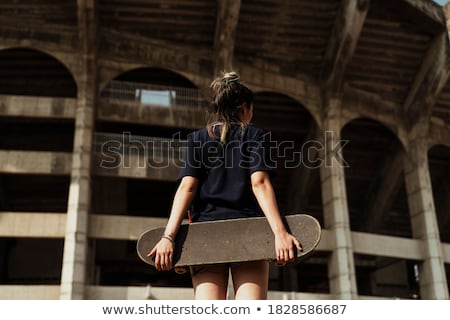 Stockfoto: Woman Standing In Front Of Colosseum