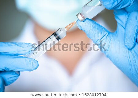 Zdjęcia stock: Syringe Medical Injection In Hand Coronavirus Vaccine Concept