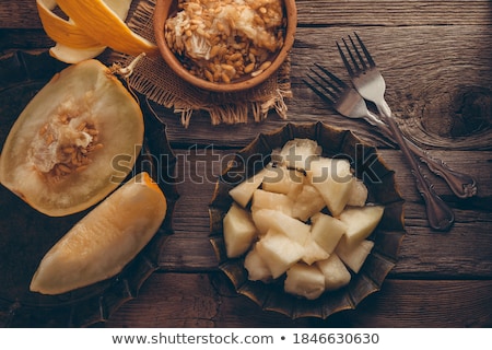 Сток-фото: Tasty Melon Pieces On Rustic Table