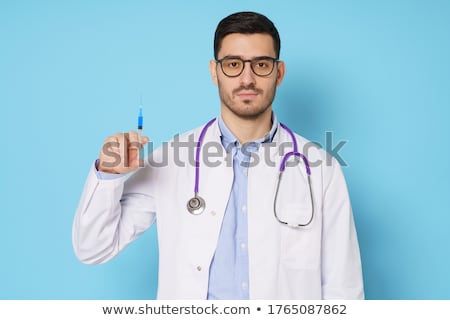 Stok fotoğraf: Serious Doctor With Syringe