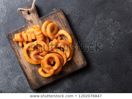 Foto stock: Curly Fries Fast Food Snack On Wooden Board With Ketchup And Glass Of Cola On Stone Kitchen Backgrou