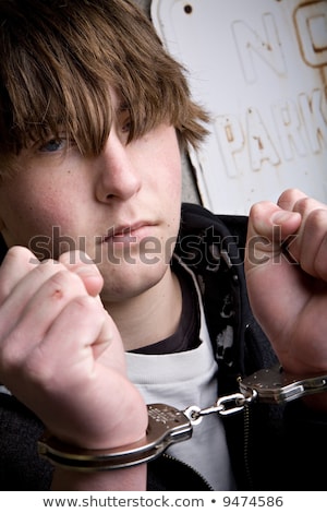 Stock foto: Teenager Under Arrest