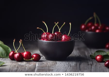 Stok fotoğraf: Sweet Cherry In Bowl On Rustic Table