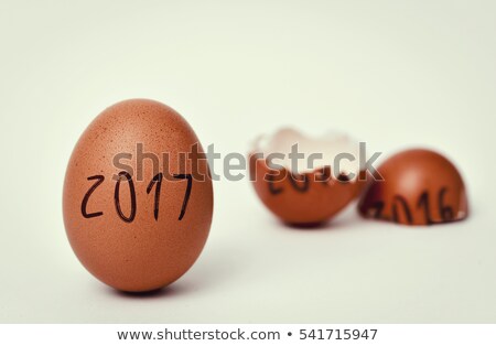 商業照片: Eggs With Numbers 2016 And 2017 For New And Old Year