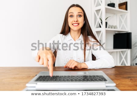 Foto d'archivio: Business Woman Pressing Button