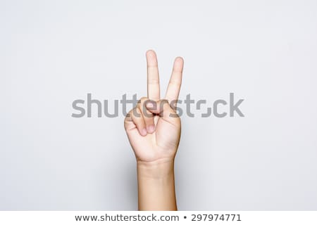 Stock fotó: Hand With Two Fingers Up In The Peace Or Victory Symbol