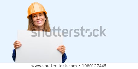 Stock fotó: Woman Engineer Holding Poster