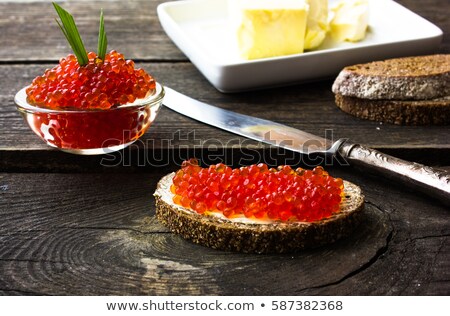 Stock photo: Silver Spoon And Caviar In White Bowl