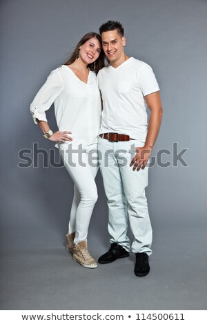 [[stock_photo]]: Vertical Shot Of A Happy Beautiful Couple Having Fun In The European City