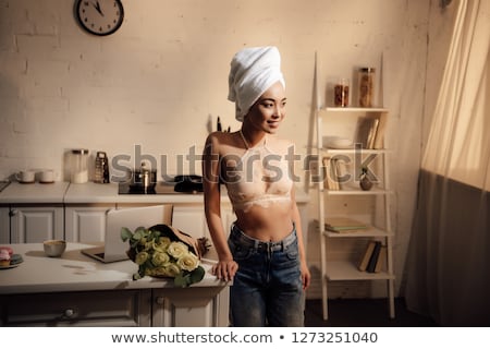 Foto stock: Woman In Lace Bralette And White Jeans