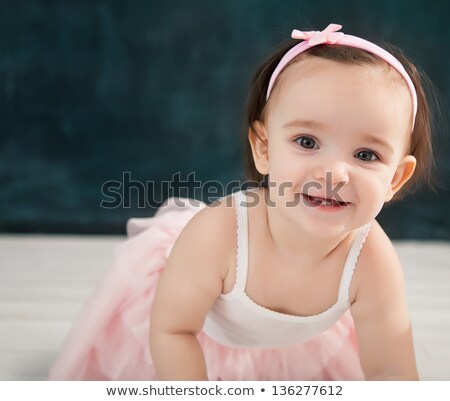 Stock photo: Portrait Of The One Year Old Baby Wearing Ballet Suit Indoor