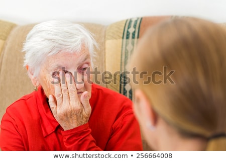 Stock photo: Sadness Senior Woman Telling Sad Story