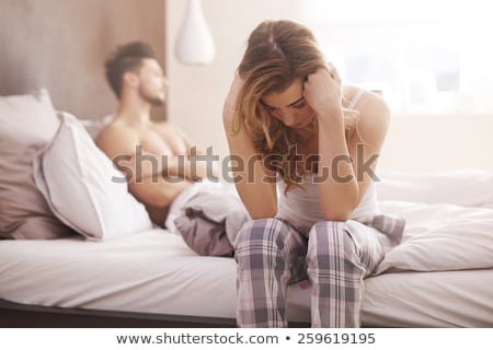 ストックフォト: Couple In Bed And Disappointed