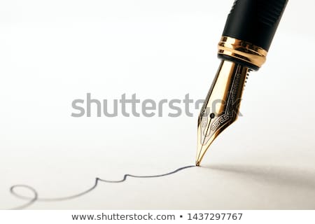 Stock photo: Fountain Pen On Notebook